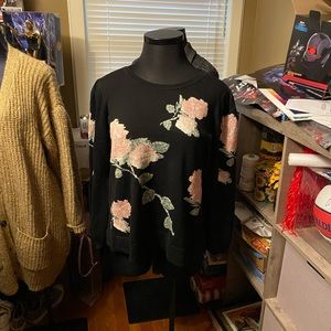 INC floral pullover sweater.